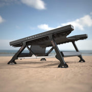 Acon Freestyle minitrampolin på stranden, sedd från sidan